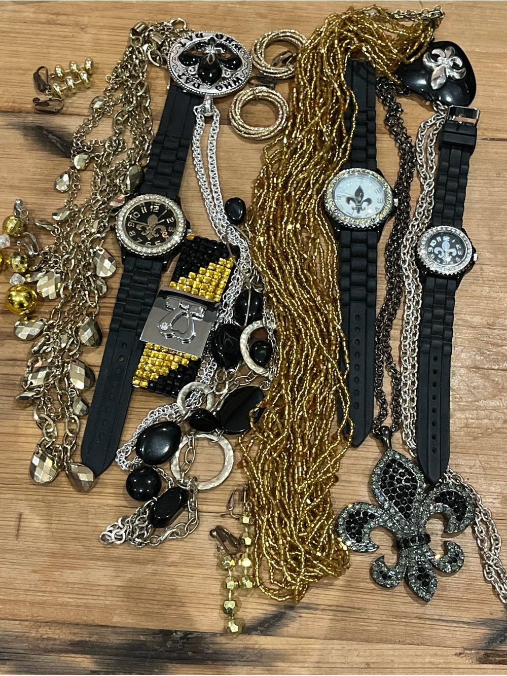 Mystery bag of 7 Black and Gold Jewelry pieces. Go New Orleans Saints.